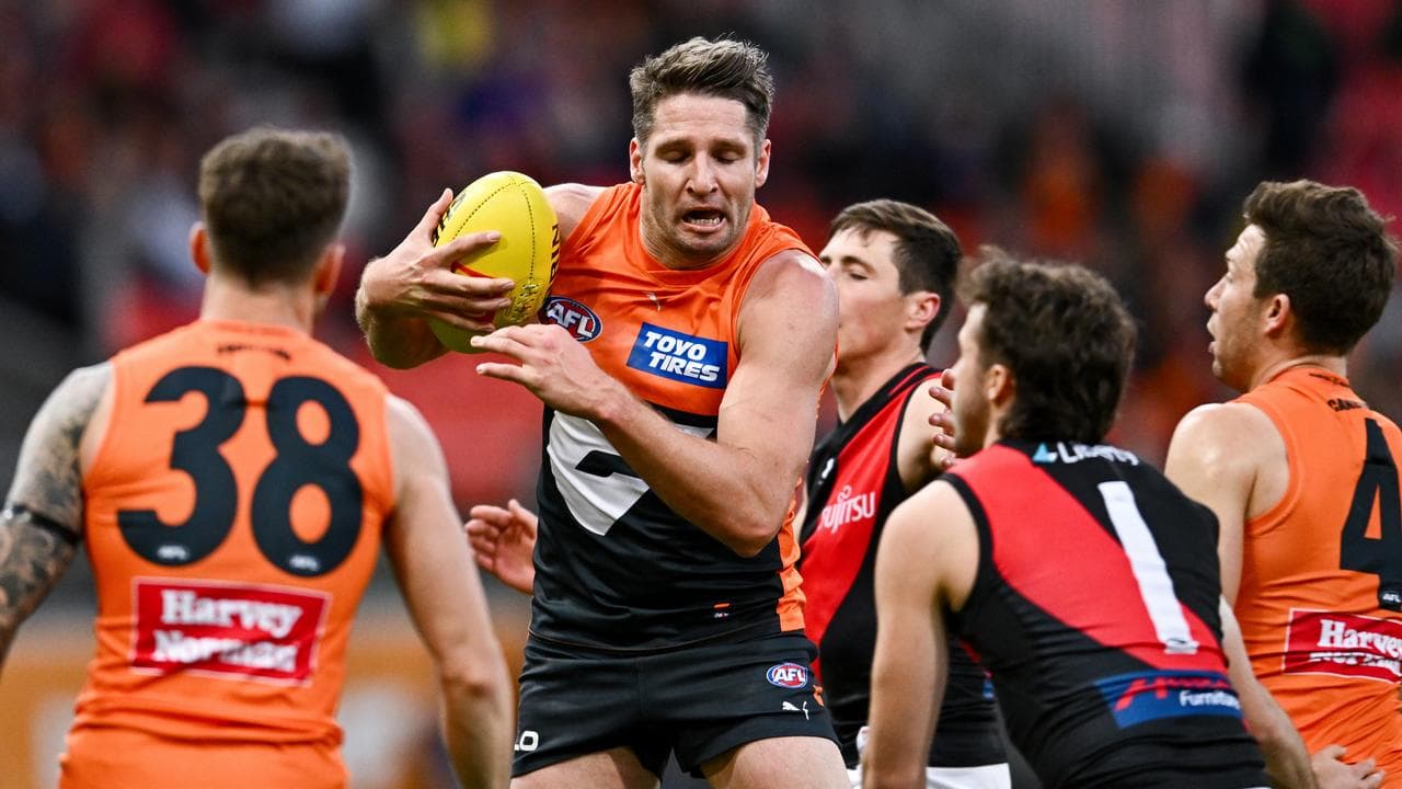 Jesse Hogan (centre) of GWS in action against Essendon.