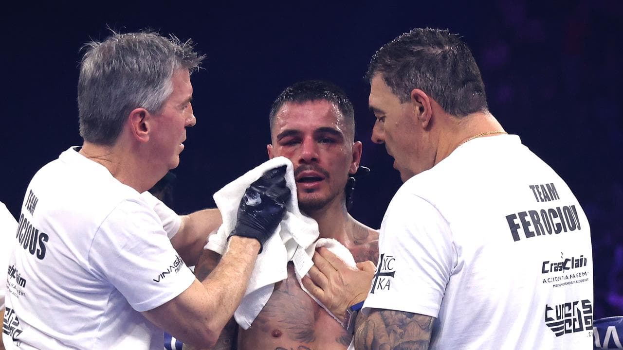 George Kambosos Jr receives medical attention. 