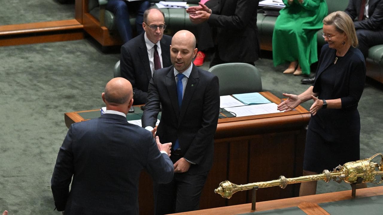 Cook Simon Kennedy is congratulated by Opposition Leader Peter Dutton