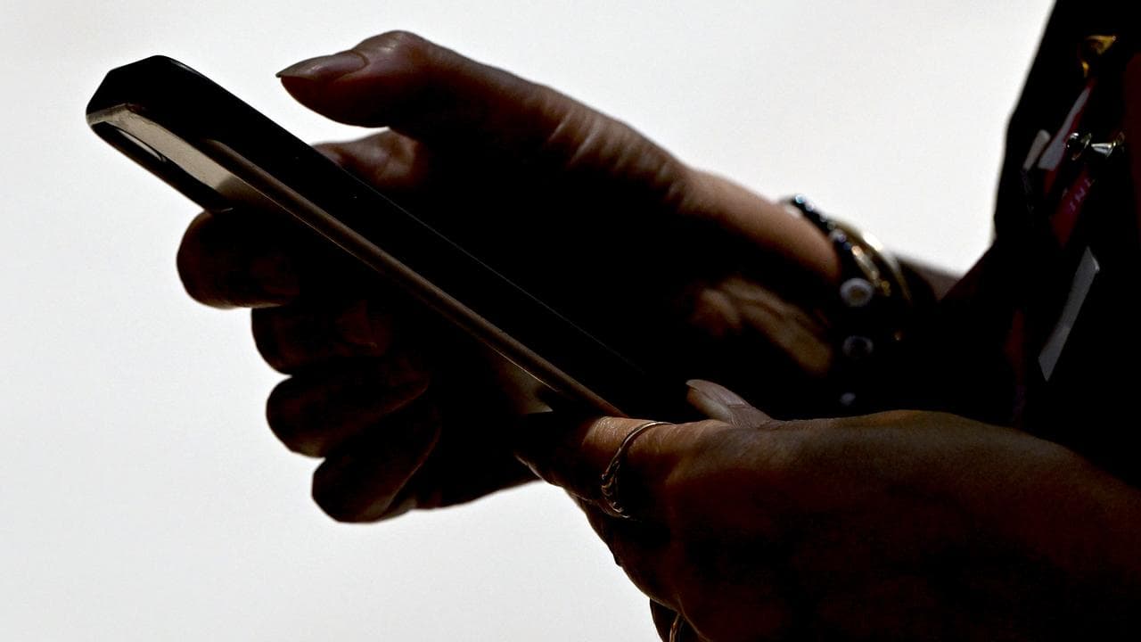 Person looking at mobile phone