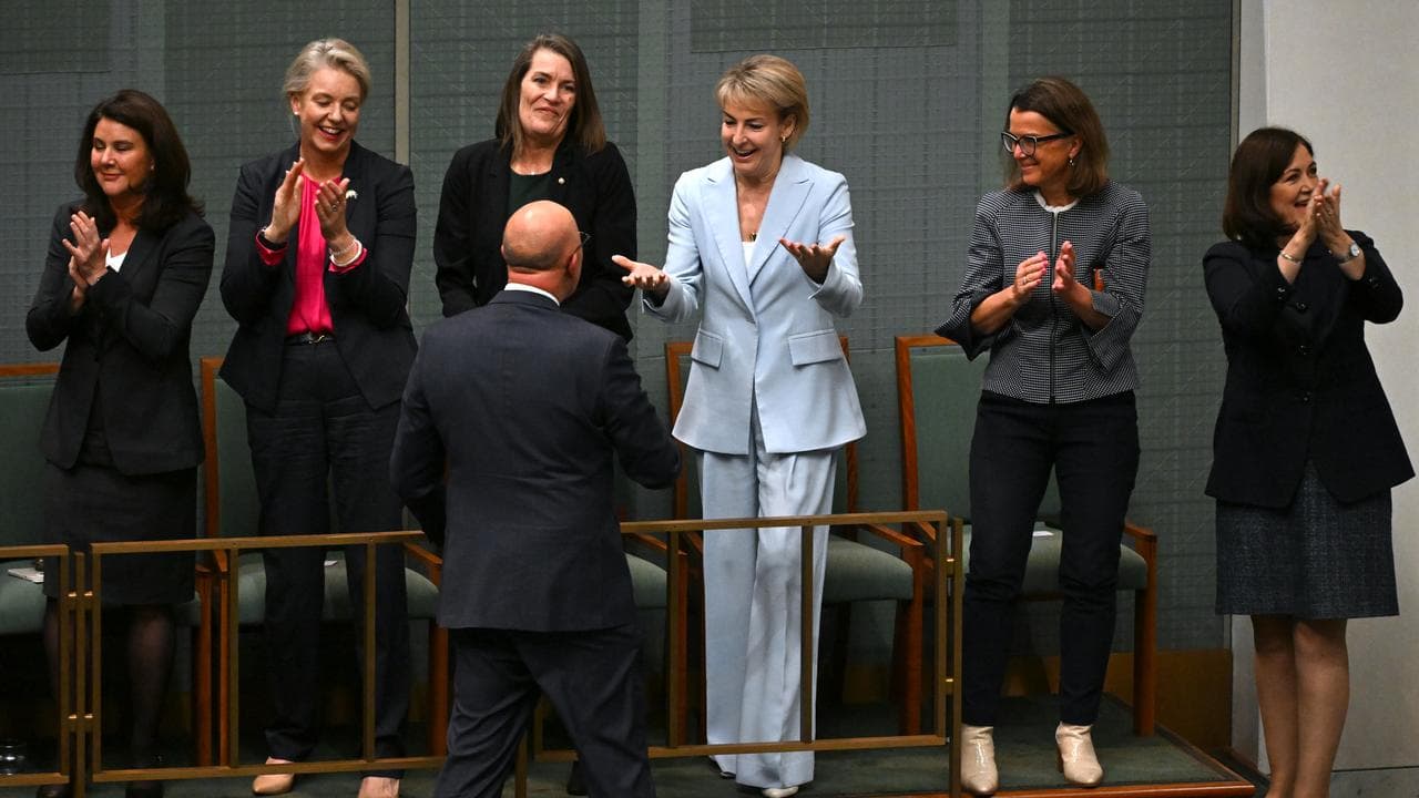 Coalition woman congratulate Peter Dutton.