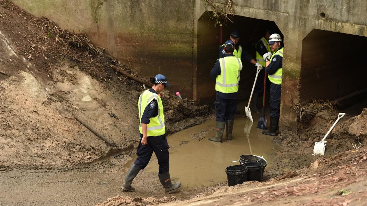 Police search a stormwater drain (file image)
