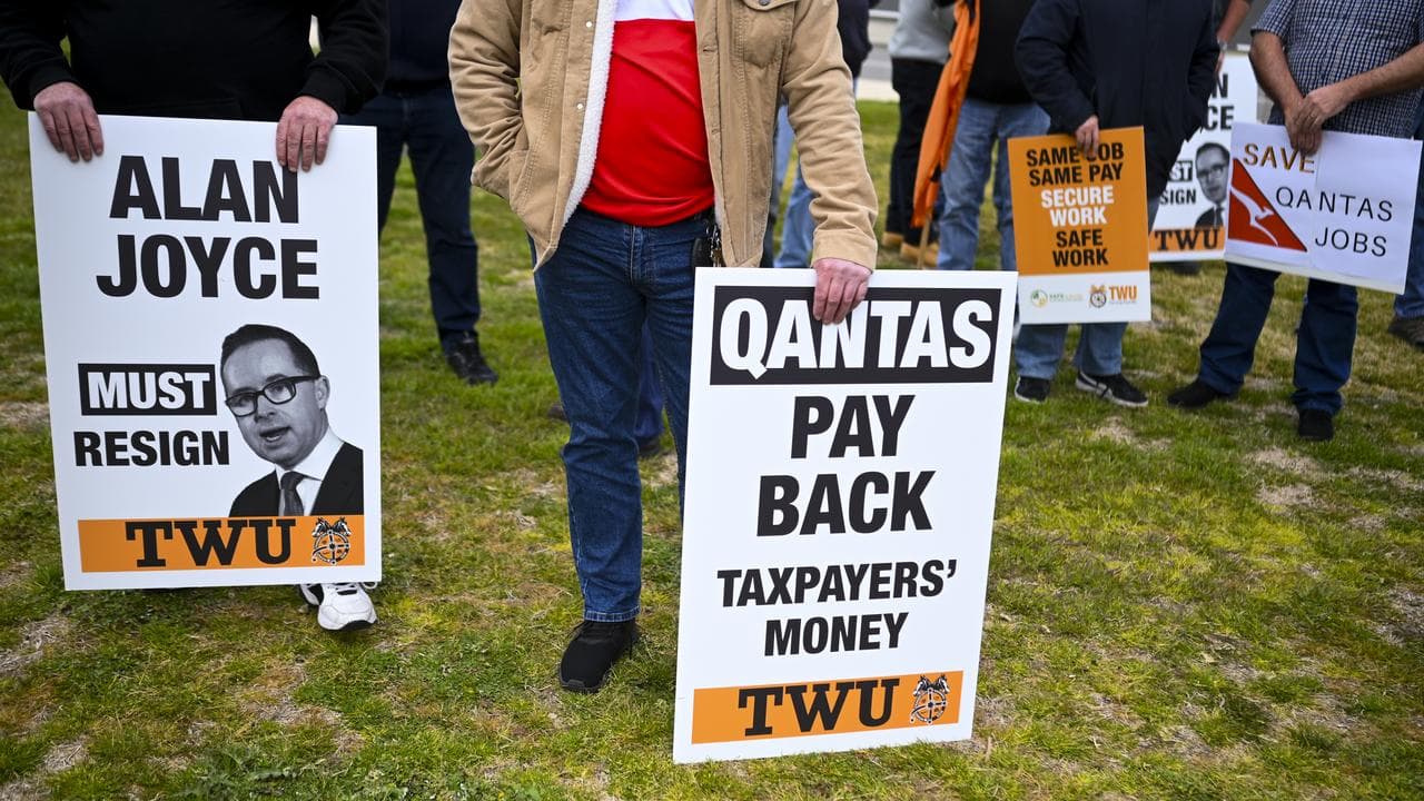 Qantas workers rally outside Parliament in Canberra (file image)