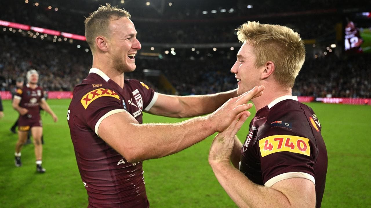 Daly Cherry-Evans with Tom Dearden.