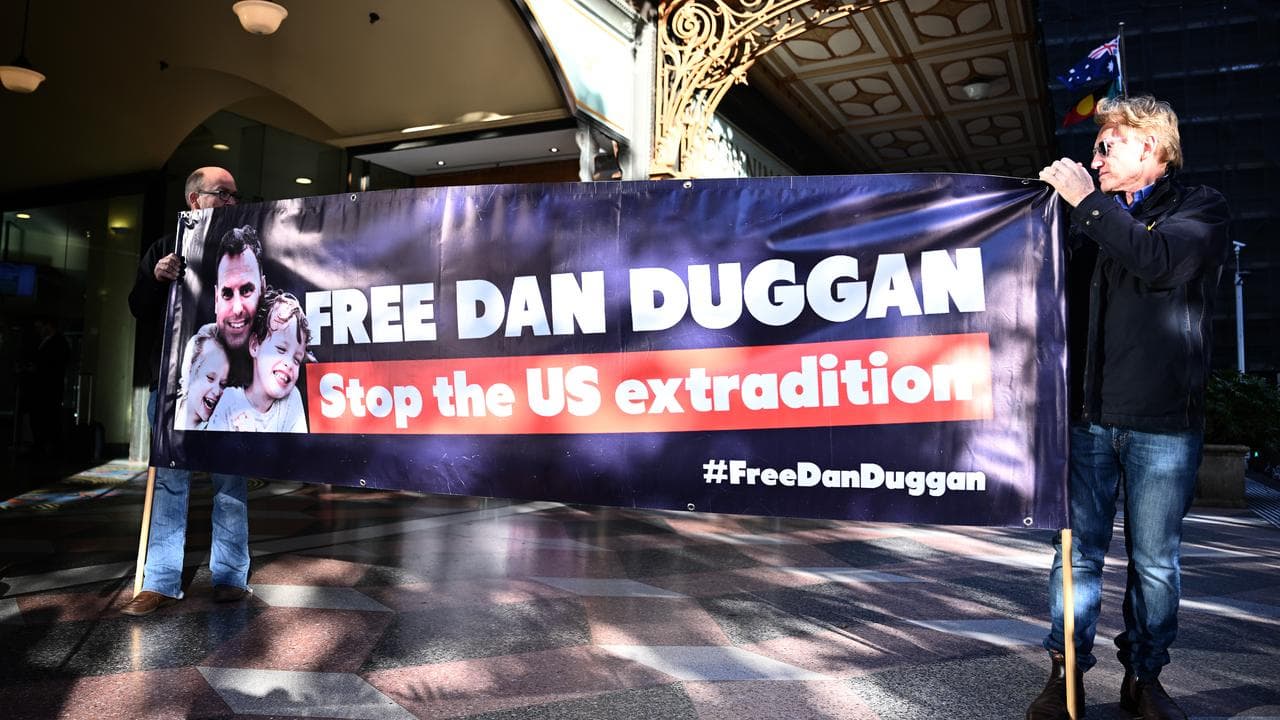 Placards prior to the extradition hearing of Daniel Duggan