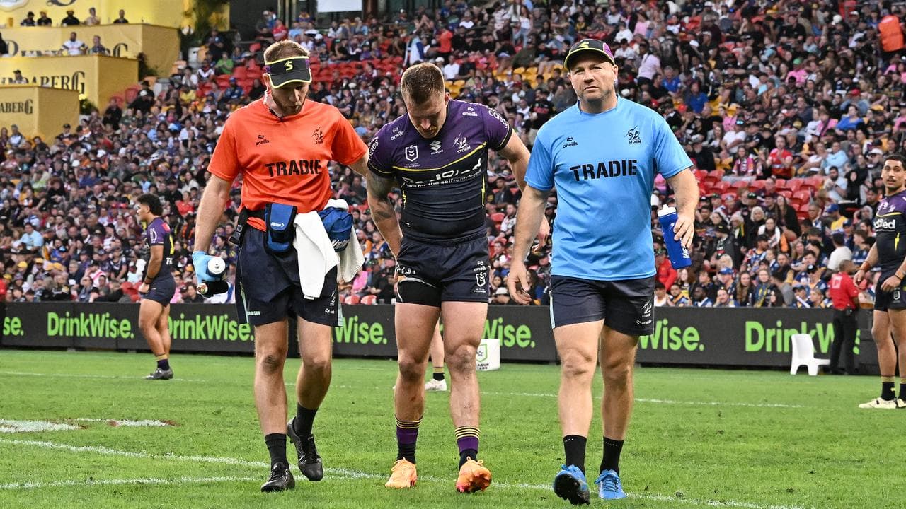 Cameron Munster hobbles off for the Storm.