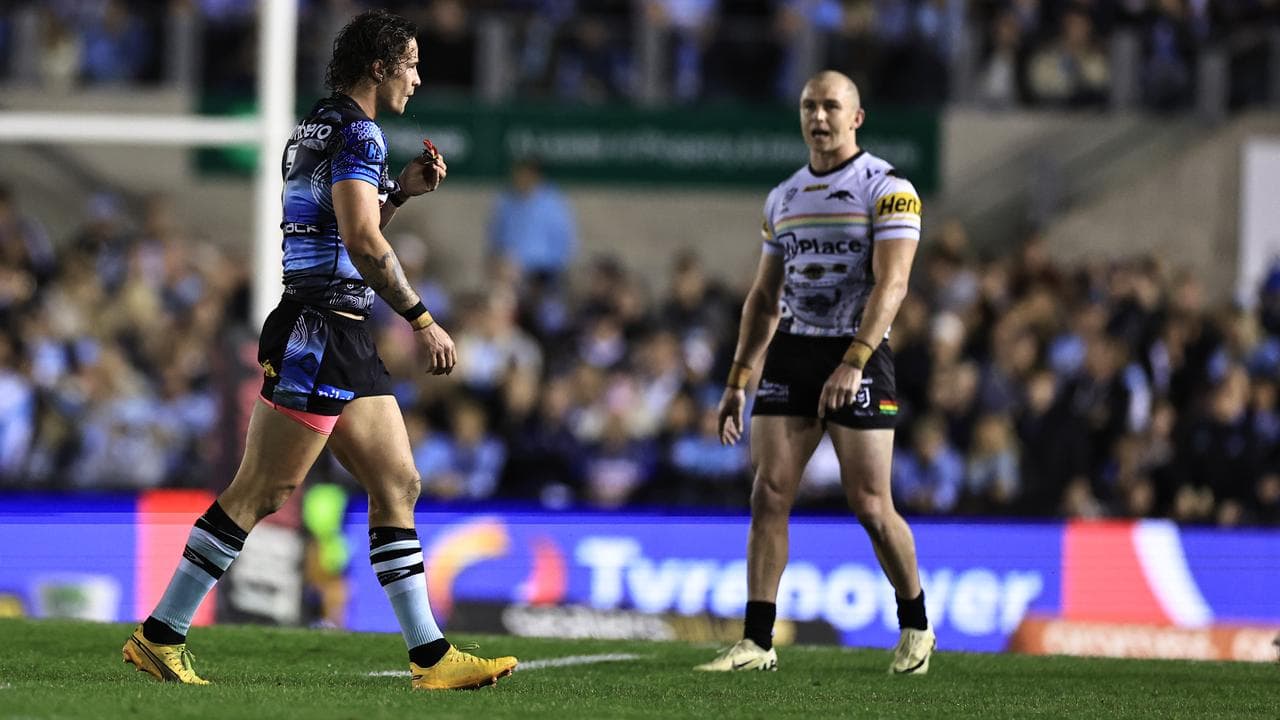 Nicho Hynes leaves the field. 