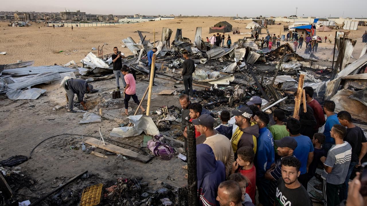 Israeli airstrikes ignited a massive blaze at a tent camp in Gaza.