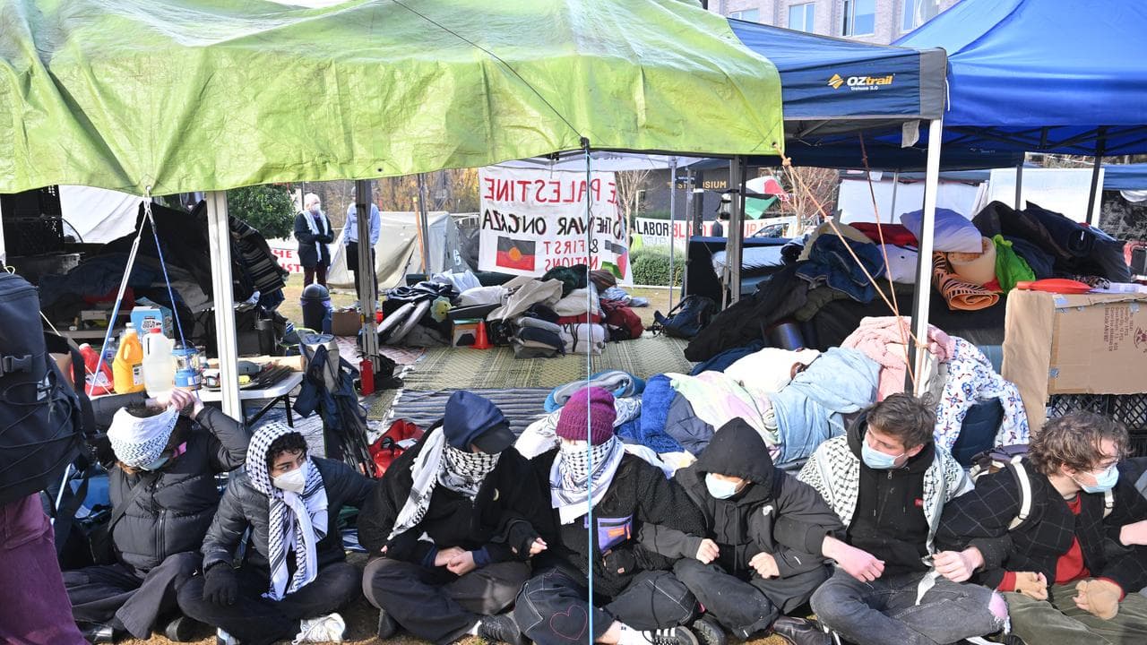 Students barricade the Gaza Solidarity encampment.