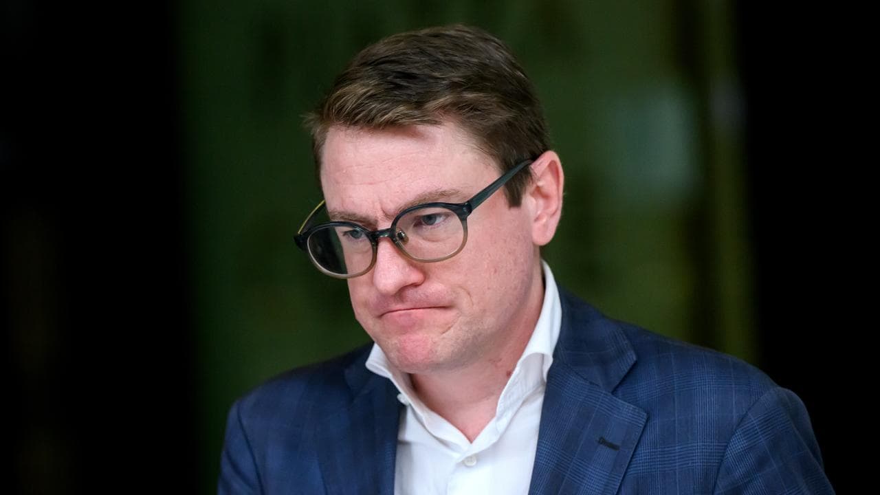 Russell Sandiford departs the Downing Centre Court