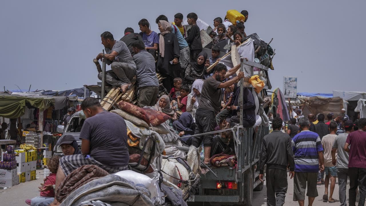 Palestinians fleeing from the southern Gaza city of Rafah