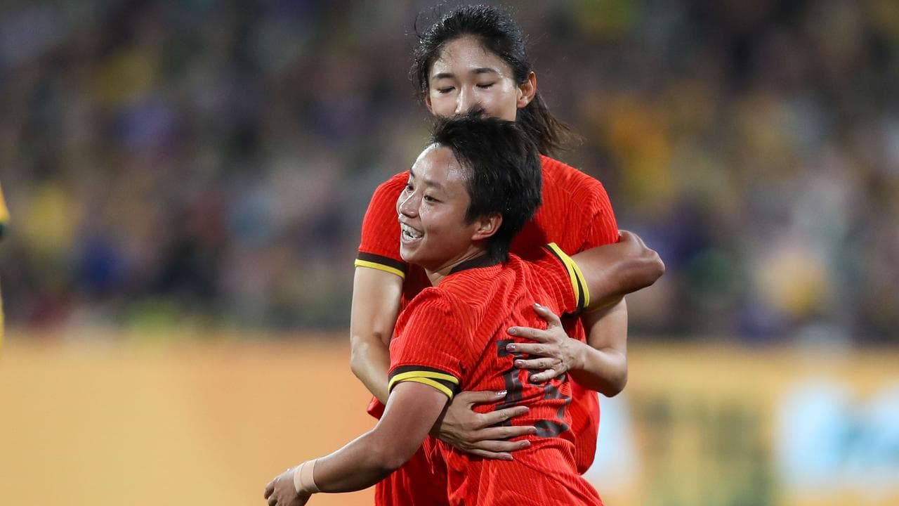 China's Zhang Linyan celebrates a goal.
