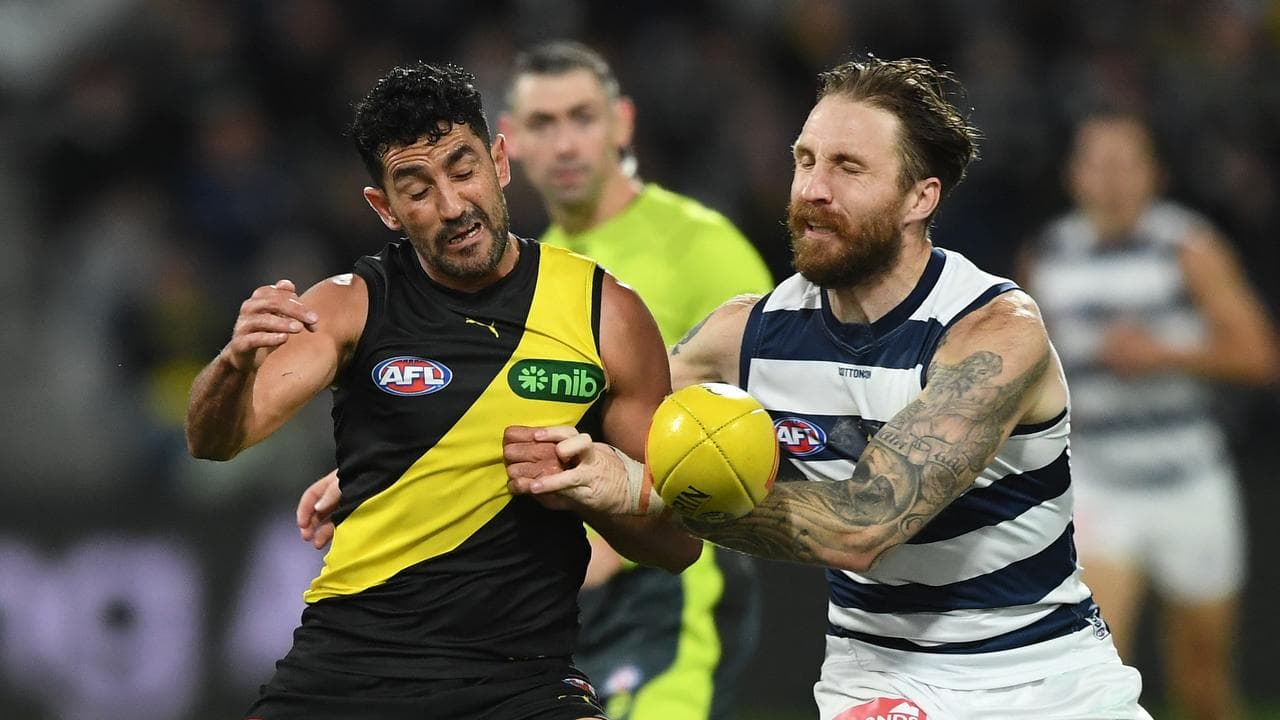 Richmond's Marlion Pickett (left) and Geelong's Zach Tuohy.