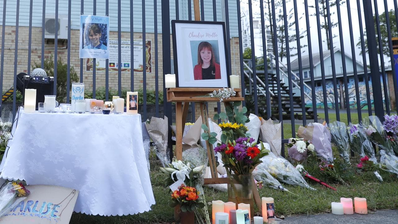 Candles and flowers at a vigil for Charlise Mutten