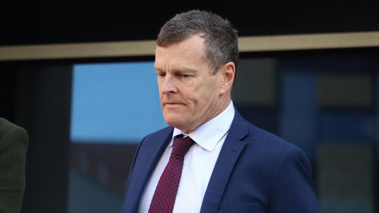 Crown prosecutor Neill Hutton leaves court