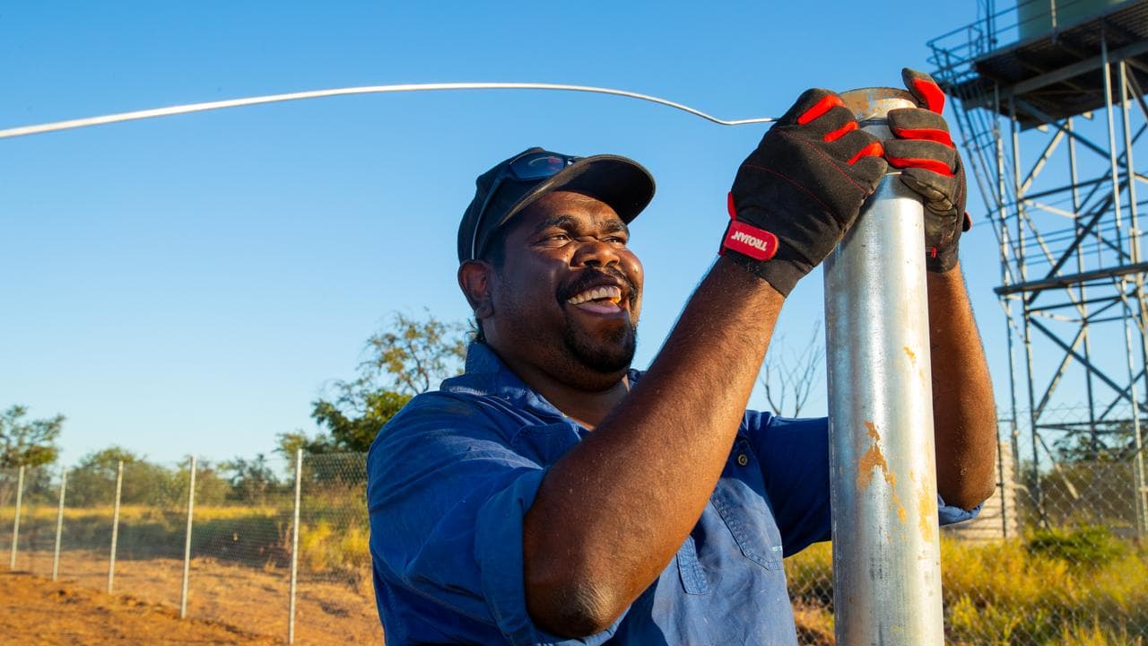 Ethan Godrey helps install a solar microgrid in Marlinja