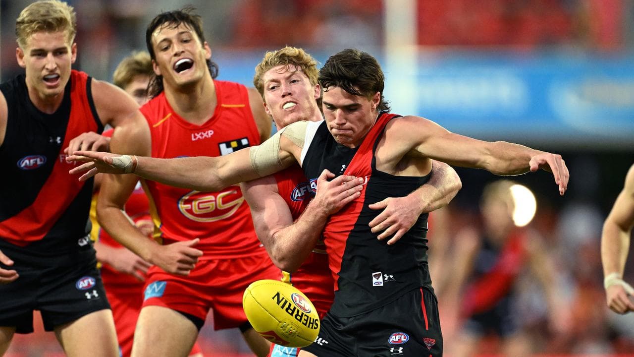 Matt Rowell tackles Sam Durham.