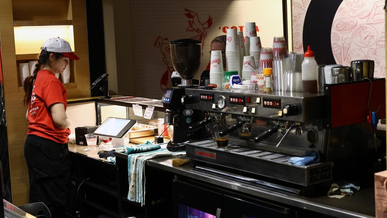 A person works in a cafe.