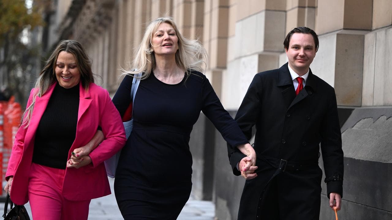 Melanie Lynn (centre), wife of Greg Lynn and son Geordie Lynn