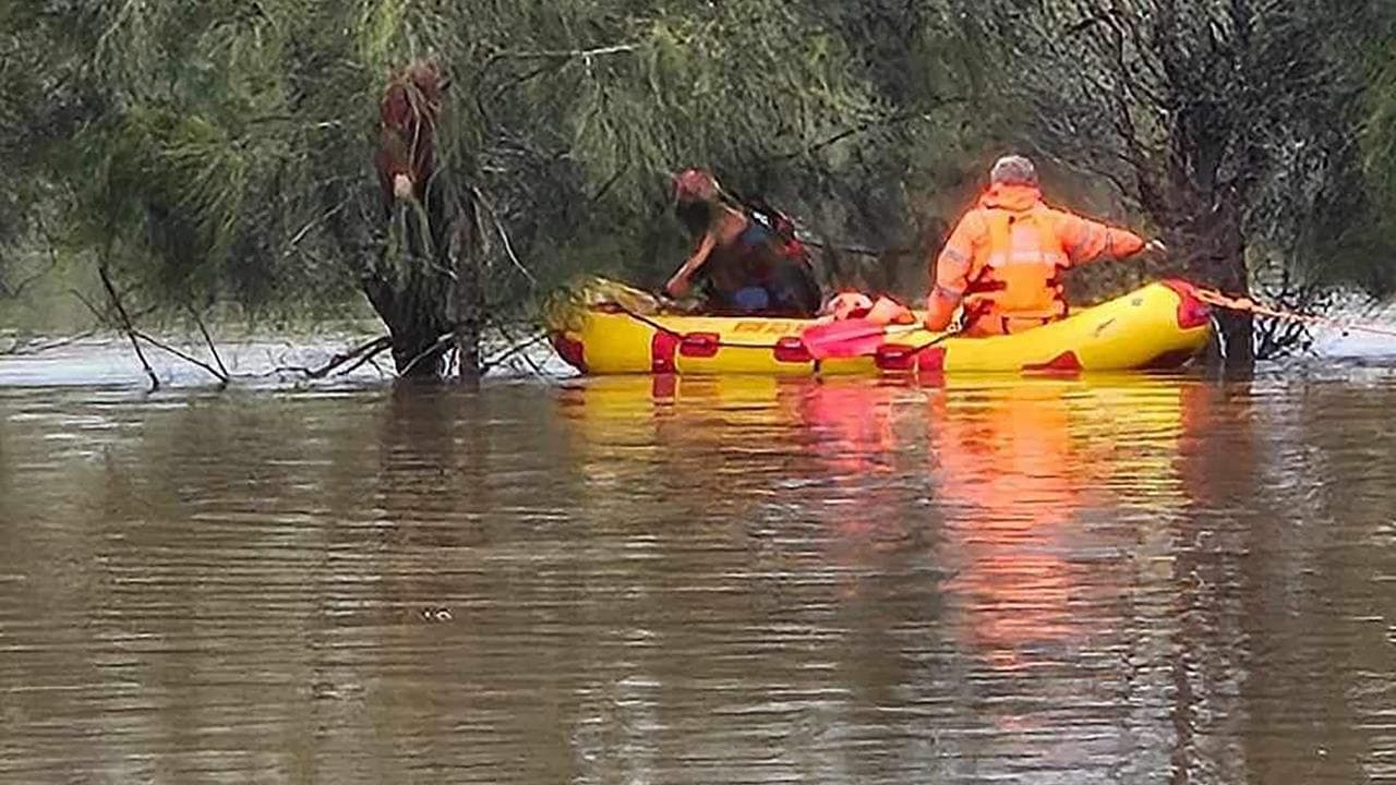 Eescue crews in action during flooding in Woollamia