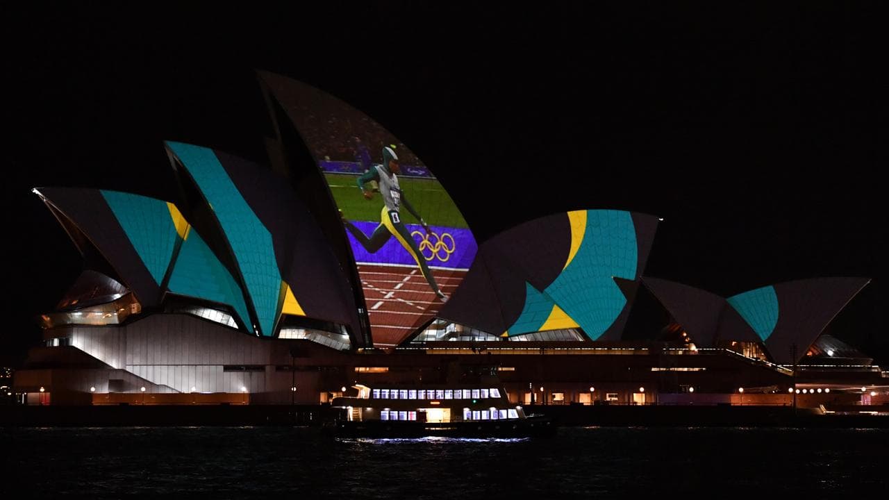Cathy Freeman on Opera House sails. 
