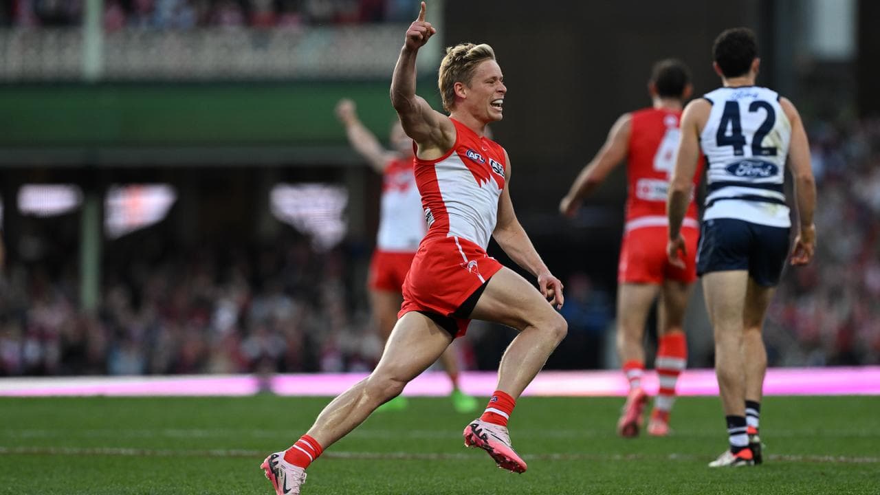 Isaac Heeney celebrates a goal.