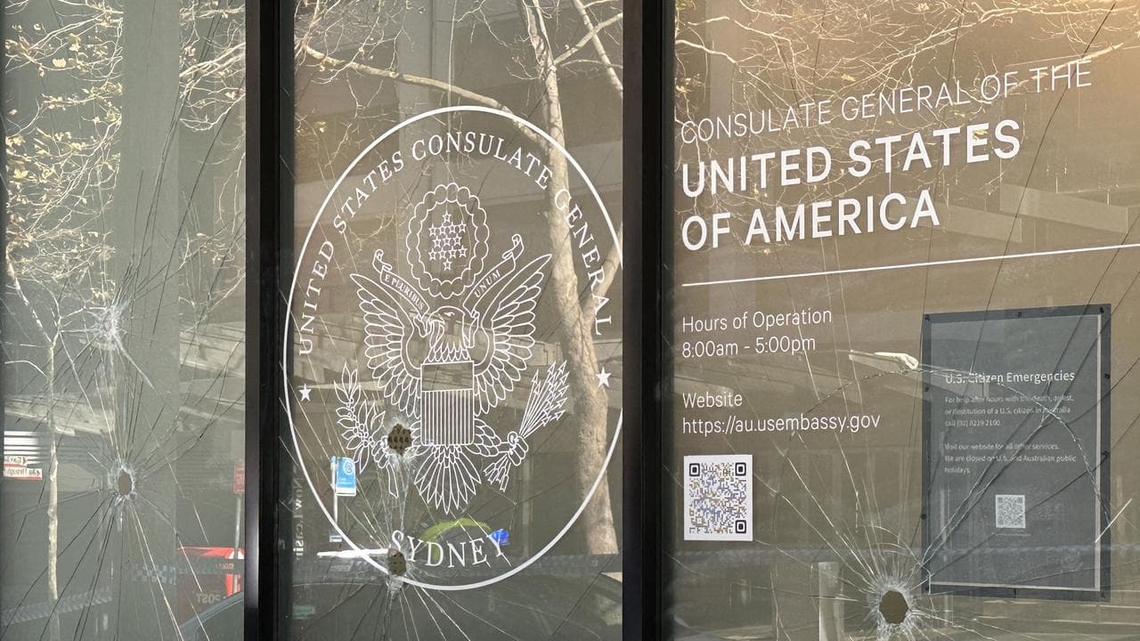 Damaged windows are seen at the US Consulate in Sydney