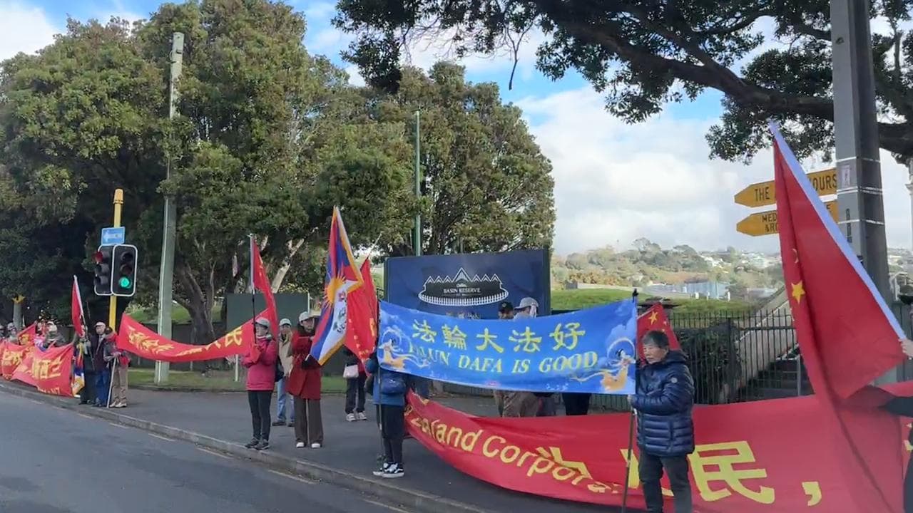 Supporters and critics of the Chinese government outside Basin Reserve