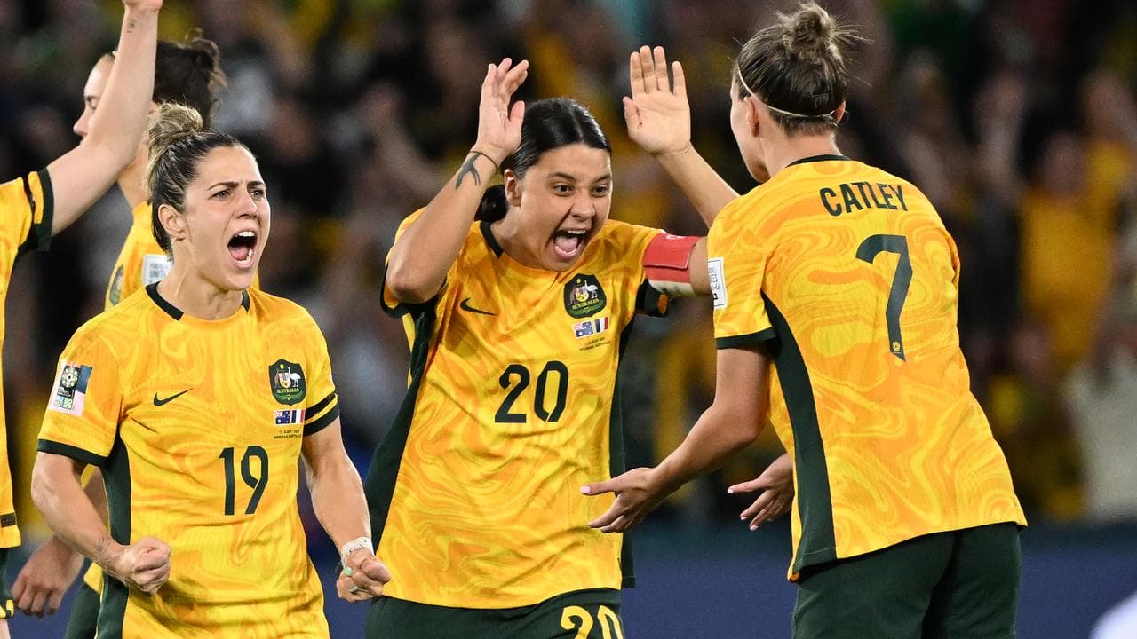Sam Kerr celebrates a goal for Australia. 
