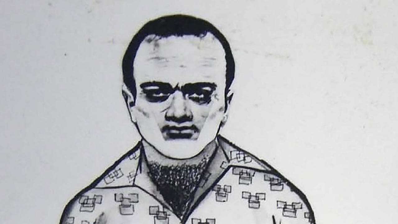 A sketch of a man seen leaving the crime scene 