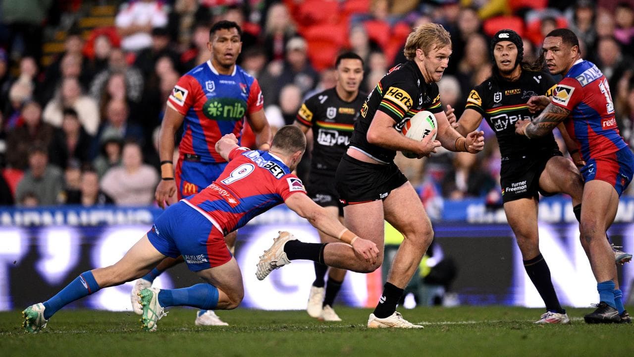 Penrith's Lindsay Smith bulldozed his way to a try against Newcastle.