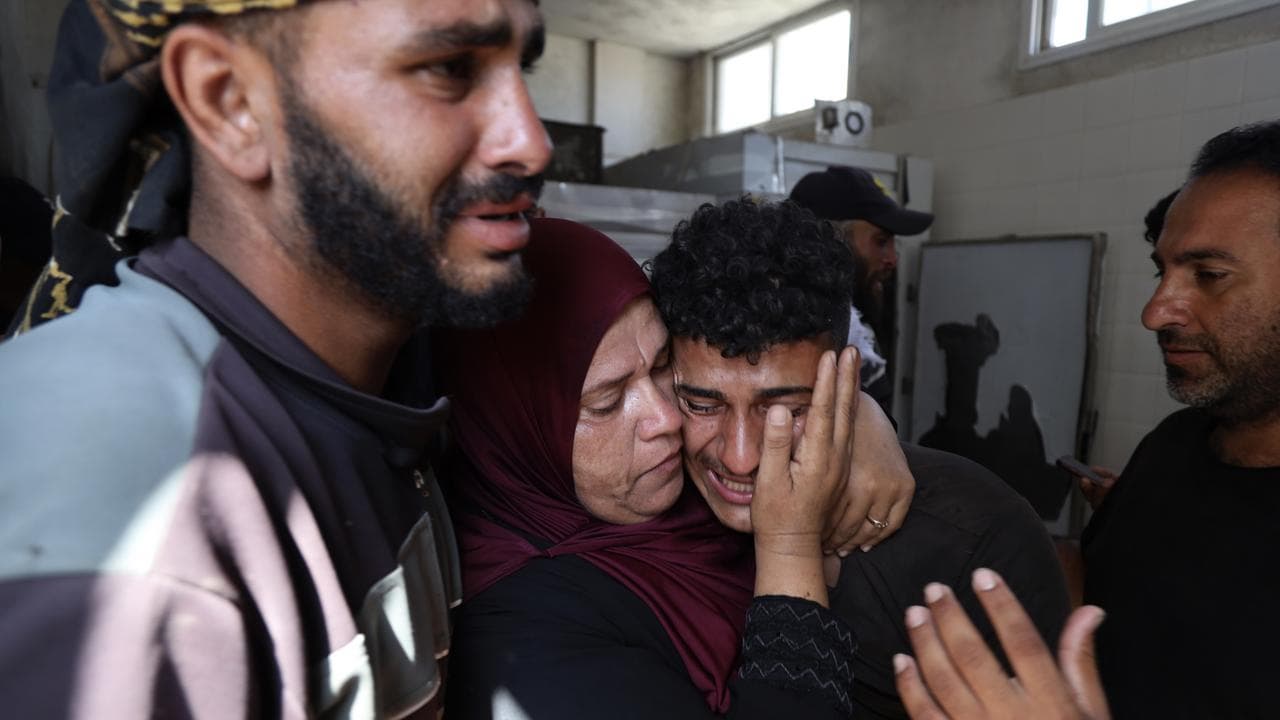 Palestinians mourn their relative killed in Al-Nuseirat camp