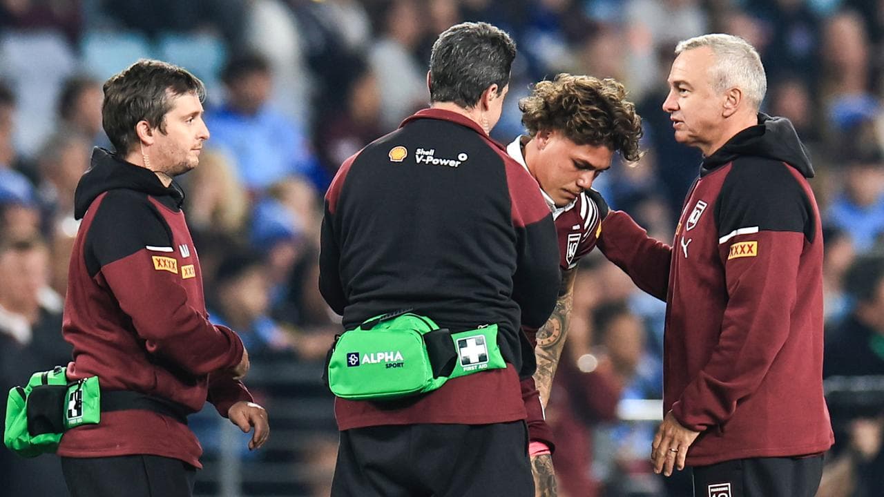 Reece Walsh receives treatment during Origin I. 