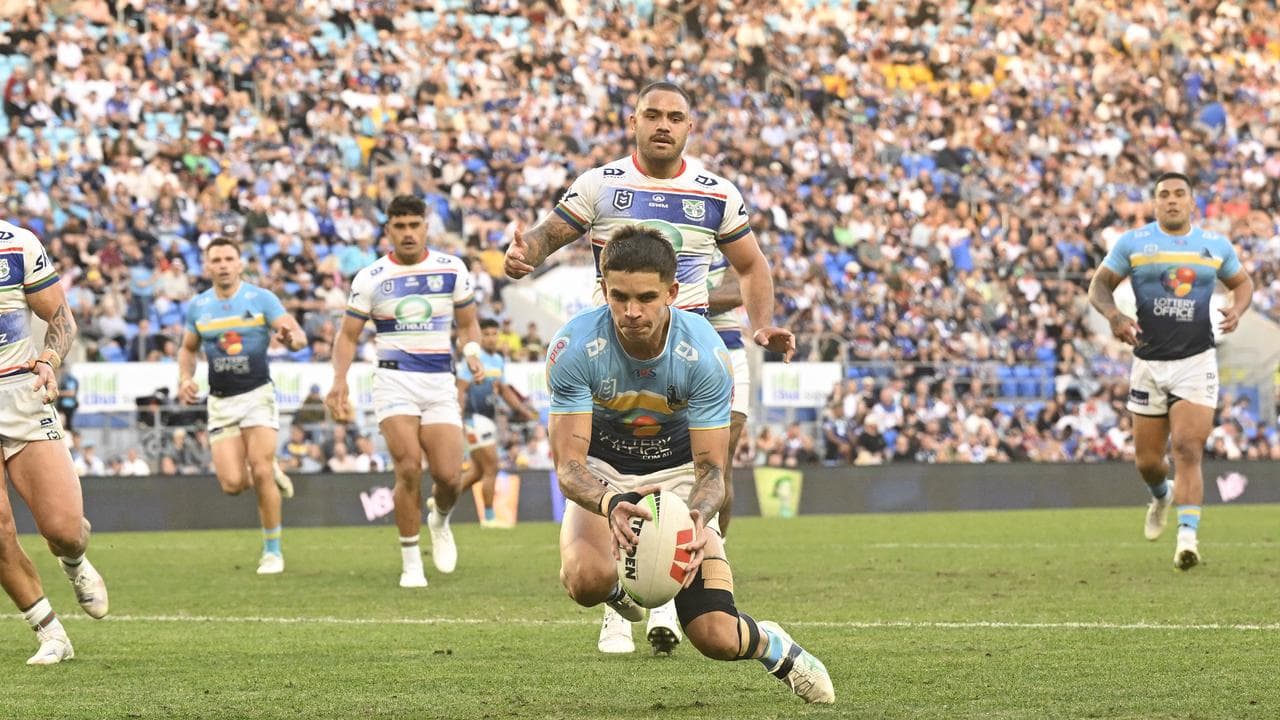 Jayden Campbell scores a try for Gold Coast against the Warriors. 