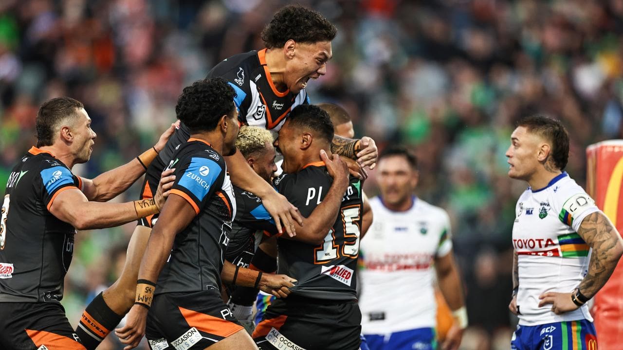 Celebrating Wests Tigers players.