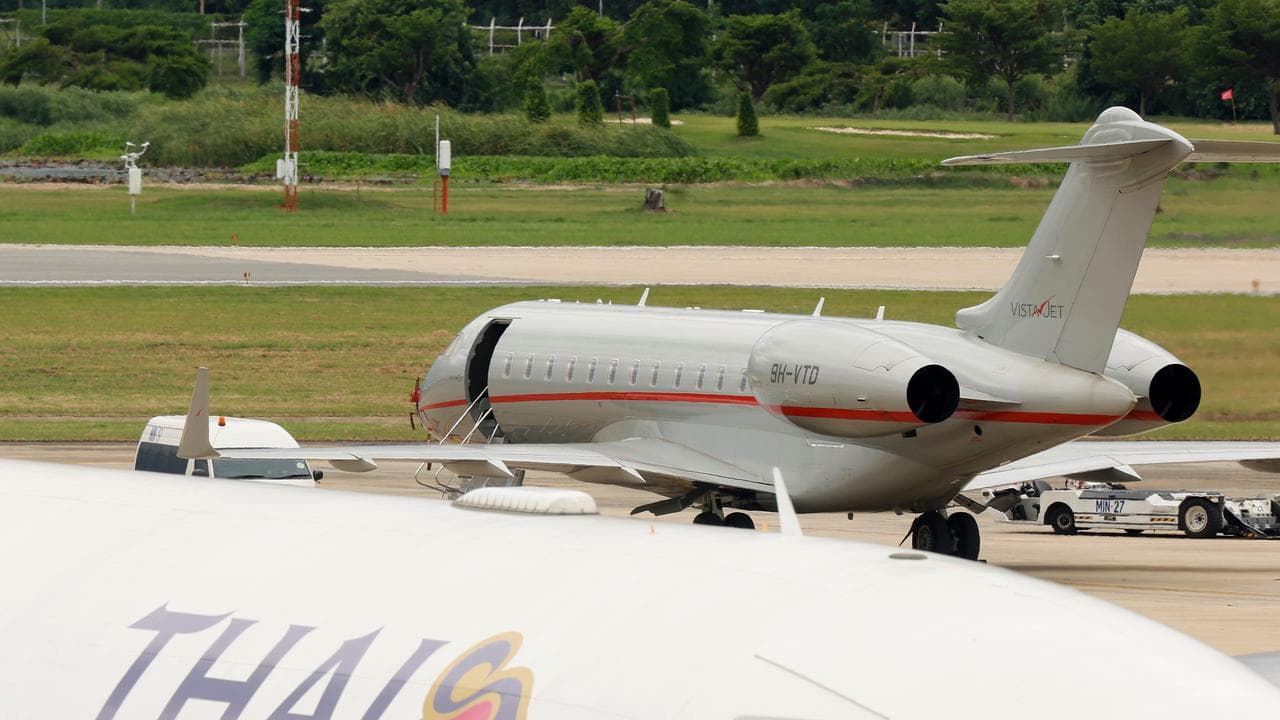 The plane carrying Julian Assange at Don Mueang International Airport