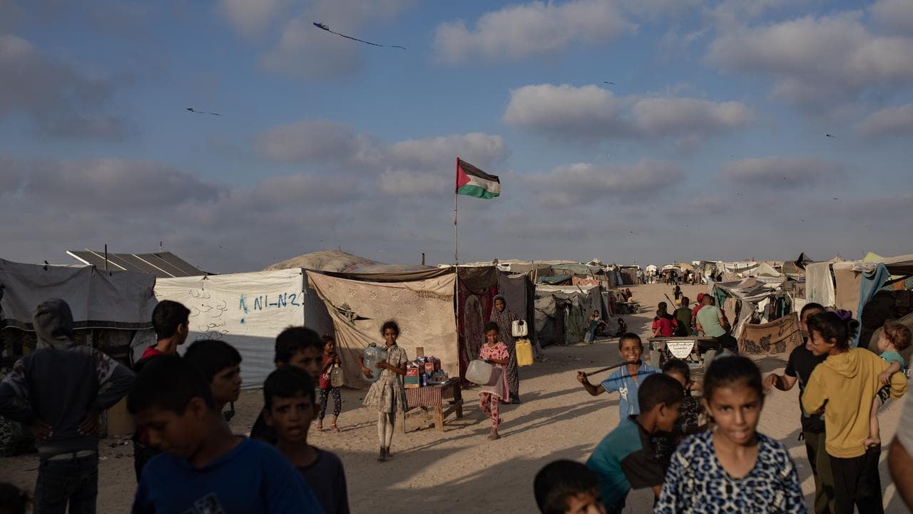 People at an displaced persons camp in Khan Yunis refugee camp