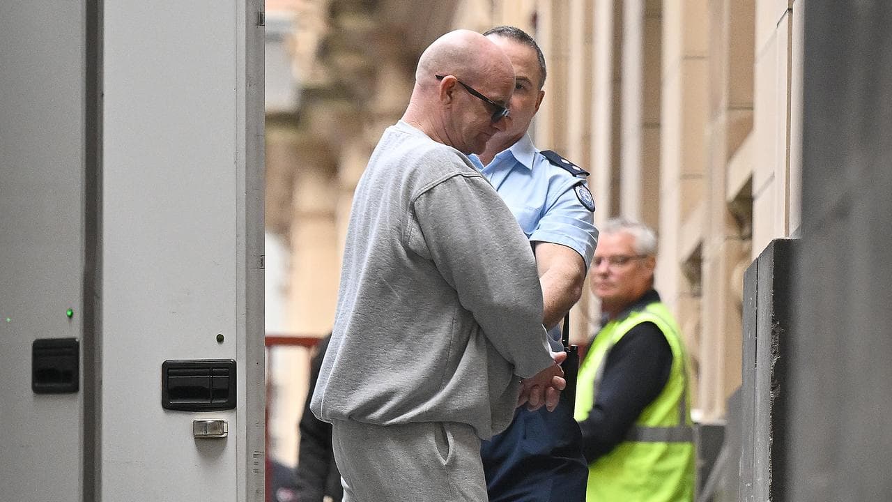Christopher Bell (left) arrives at the Supreme Court of Victoria