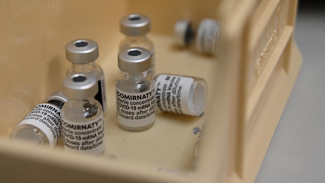 Vials of the Pfizer COVID-19 vaccination in a plastic container