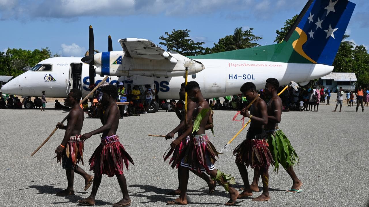 Performers at Seghe Airport 