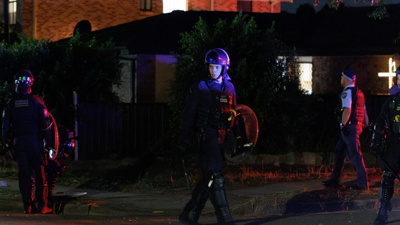 Police respond to rioting outside the church (file image)