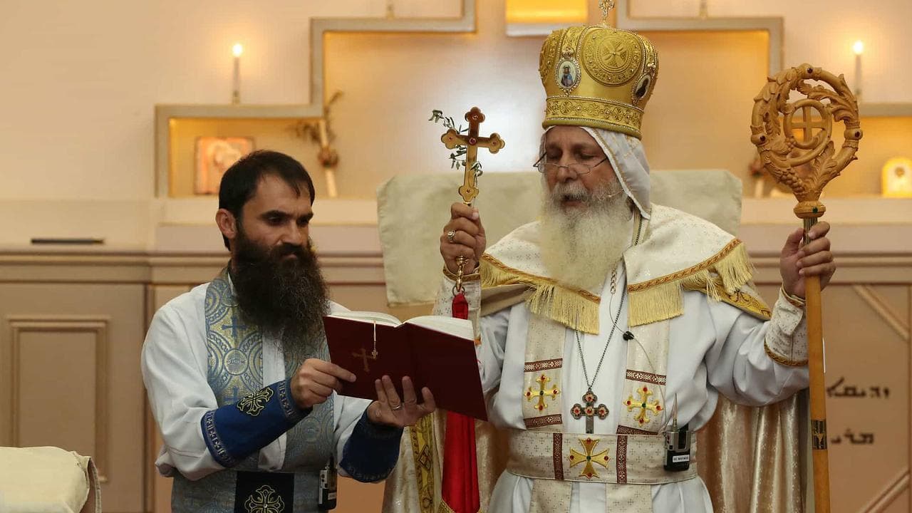 Father Isaac Royel (left) and Bishop Mar Mari Emmanuel (file image)