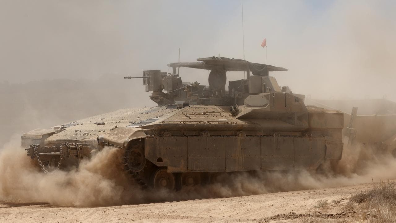 An Israeli armoured personnel carrier near the border with Gaza 
