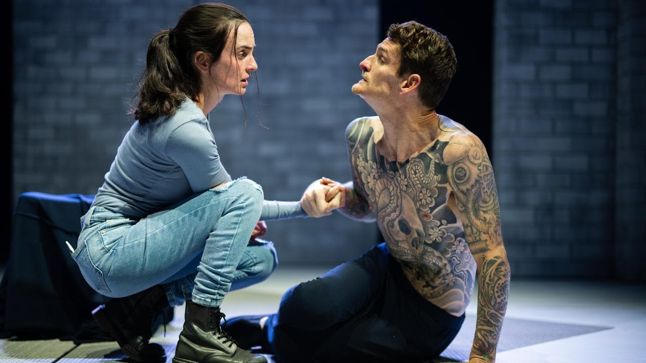 Dan Daw as John and Zoe de Plevitz as Jess perform in Cost of Living.