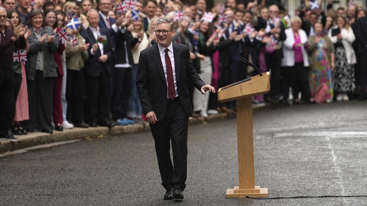 Keir Starmer in front of supporters