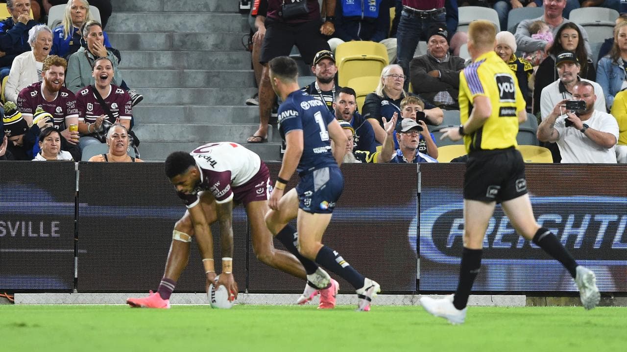 Jason Saab scores one his tries for Manly against the Cowboys.