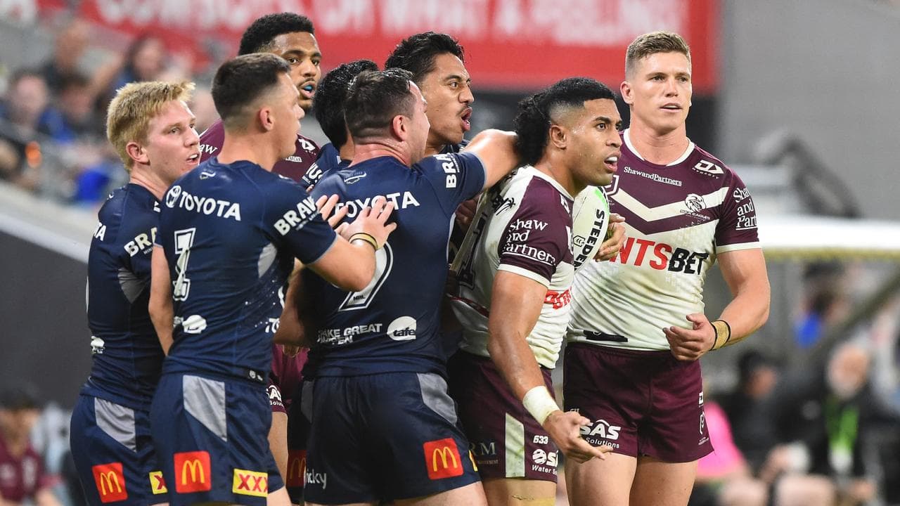 Manly's Tolu Koula (second right).