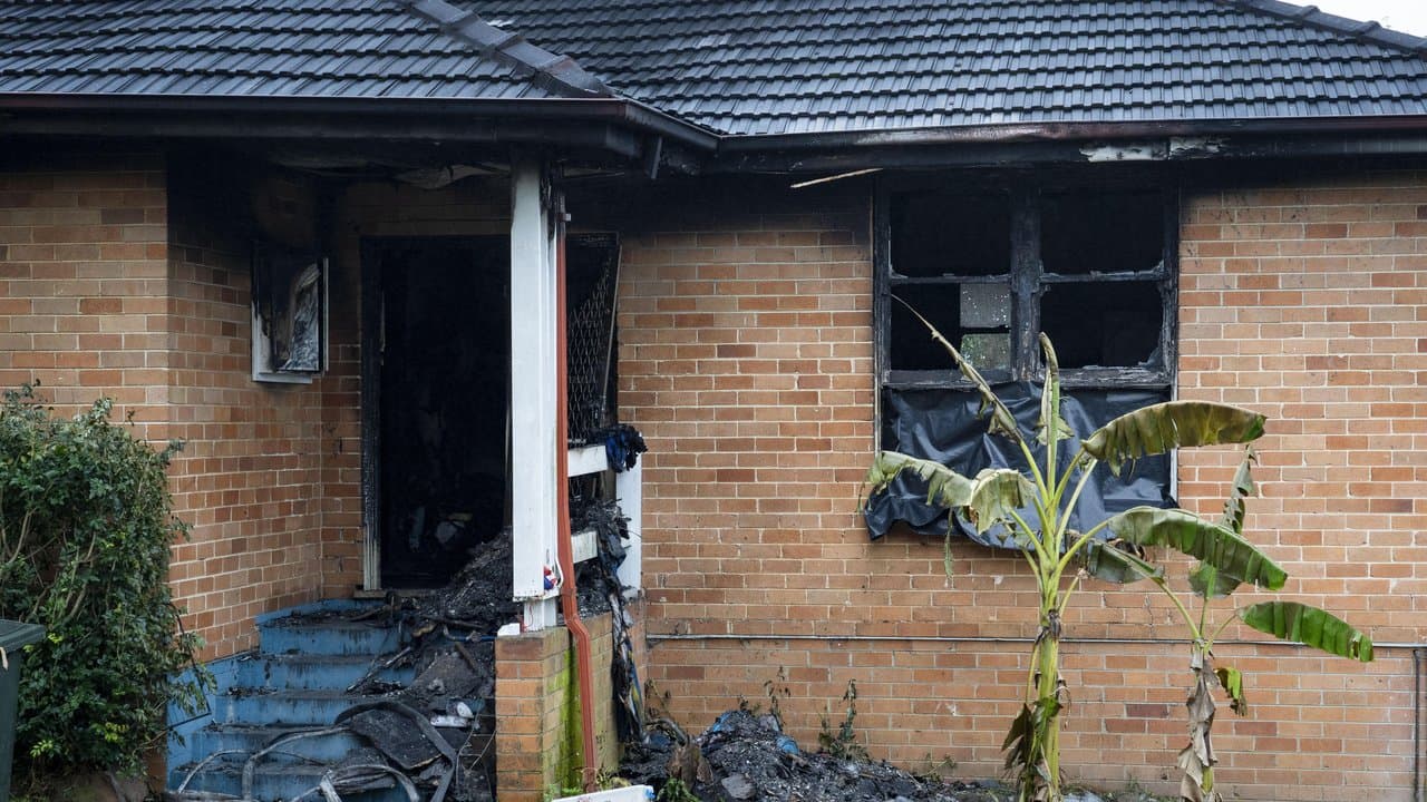 Scenes at the site a fatal house fire at Lalor Park in Sydney's west