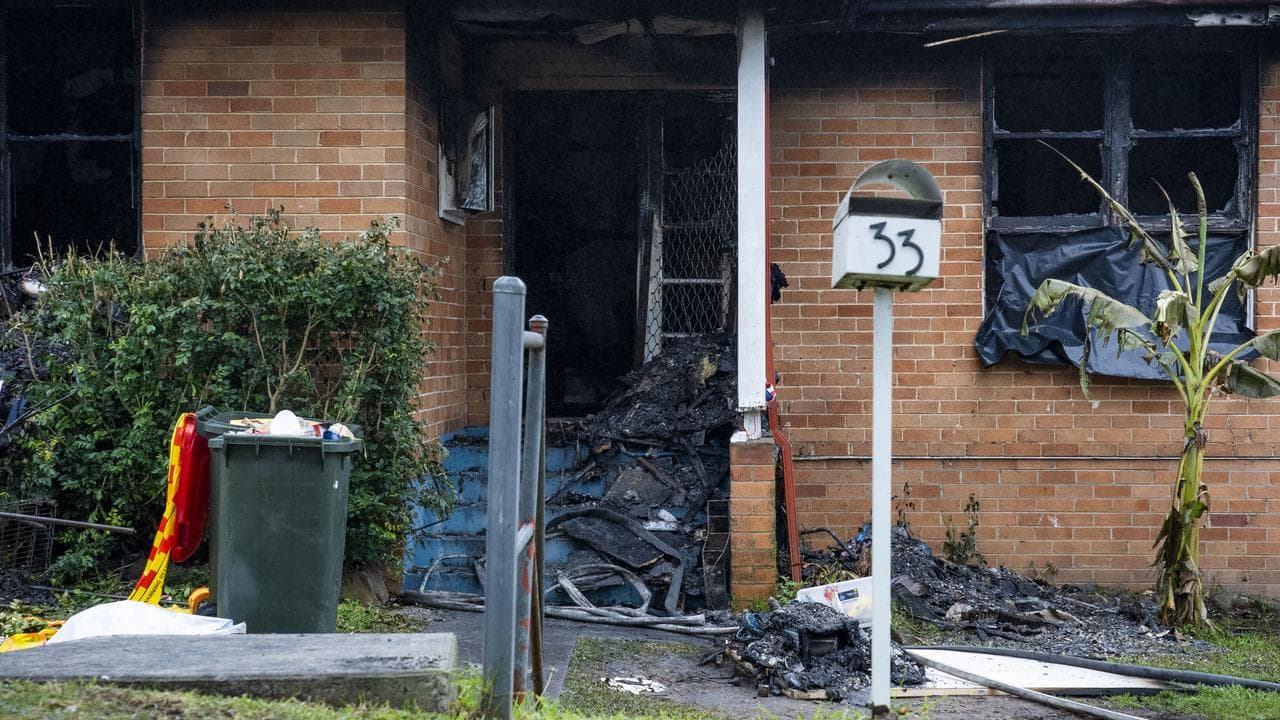 Scenes at the site a fatal house fire at Lalor Park in Sydney's west