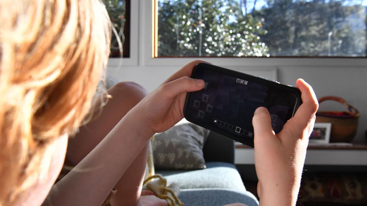 Child uses mobile device